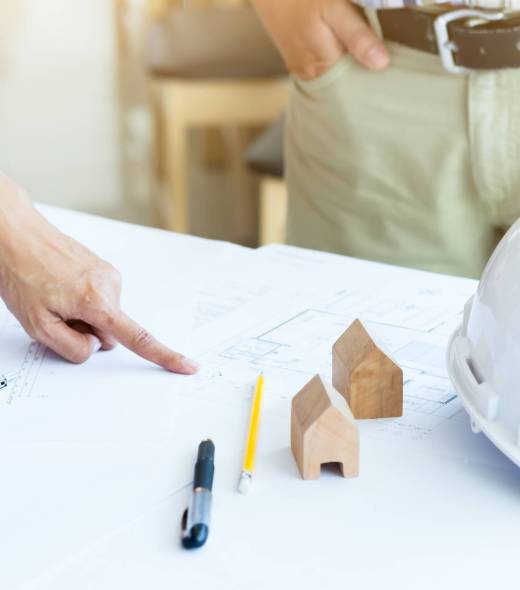 Image of engineer meeting for architectural project. working with partner and engineering tools on workplace vintage tone.